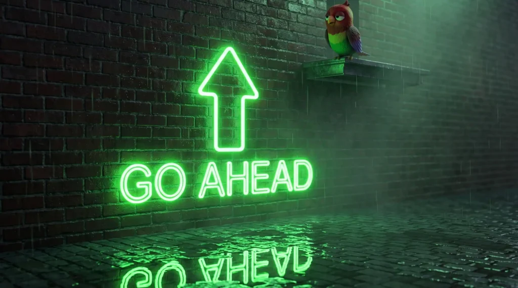 Неоновая вывеска GO AHEAD с зелёной стрелкой на кирпичной стене ночного Лондона, отражение в луже на мостовой